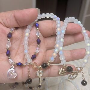 Choose 1, purple flower bracelet, gold heart bracelet, gold heart key bracelet